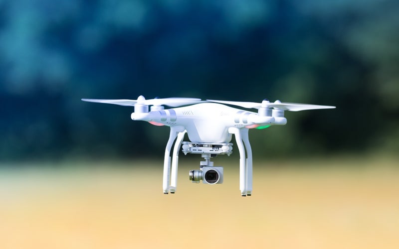 A drone or Uncrewed Aircraft Systems (UAS) hovers during training.