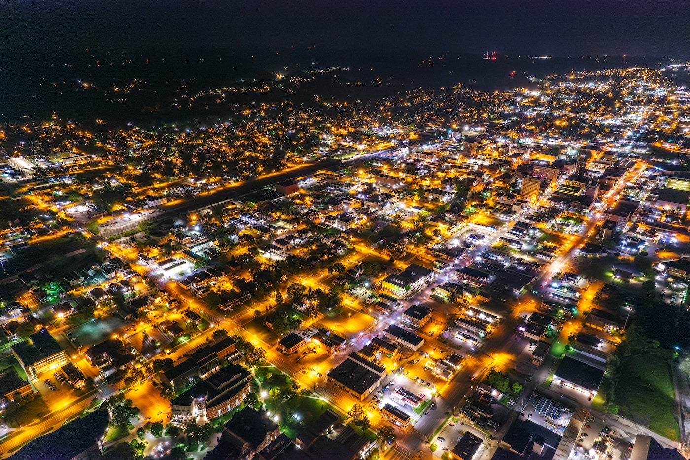drone shot of the City of Huntington at night