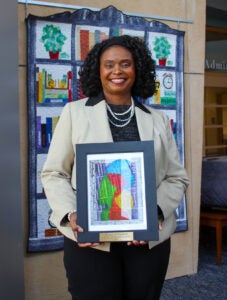 Cynthia Jones receiving her award