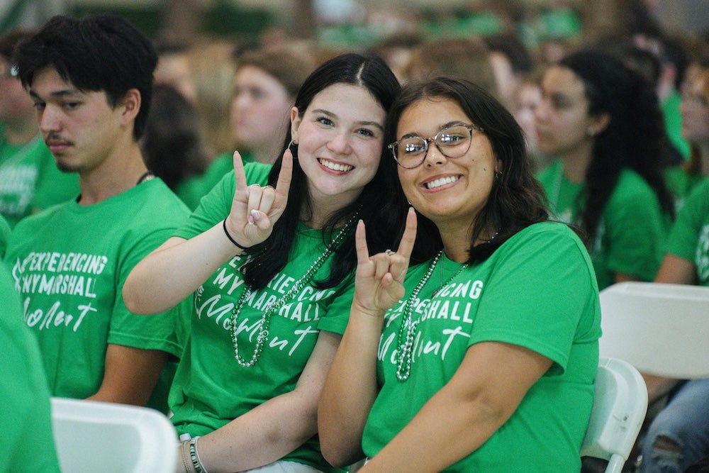 Two female students at convocation