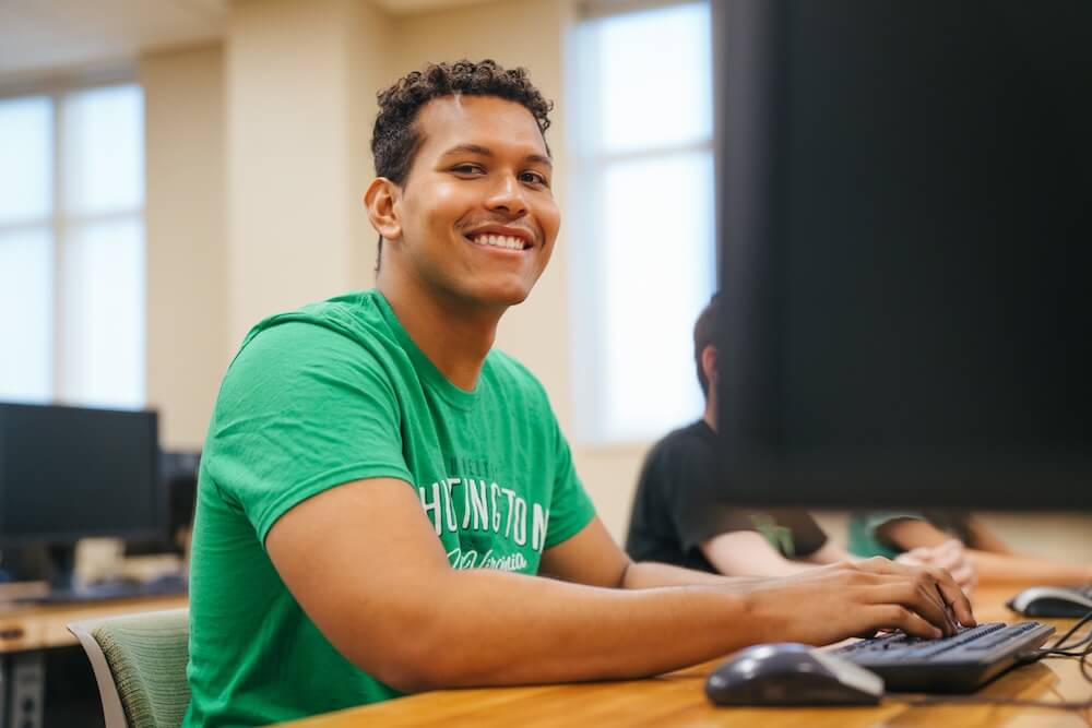 student working on a computer